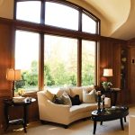 a large arched window in a living room